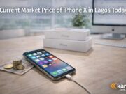 Current market price of iPhone X in Lagos today iPhone X placed on a desk with Nigerian naira notes and coins showing the current market price of iPhone X in Lagos today